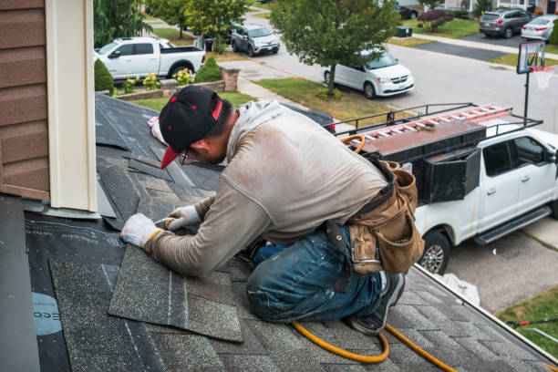 Professional Roofing technician working in Tylersport, PA